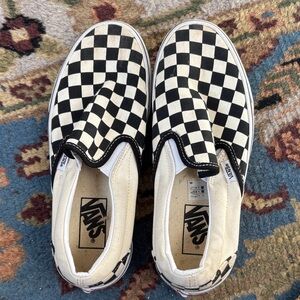 Vans women’s Black and White Checkered Sneakers